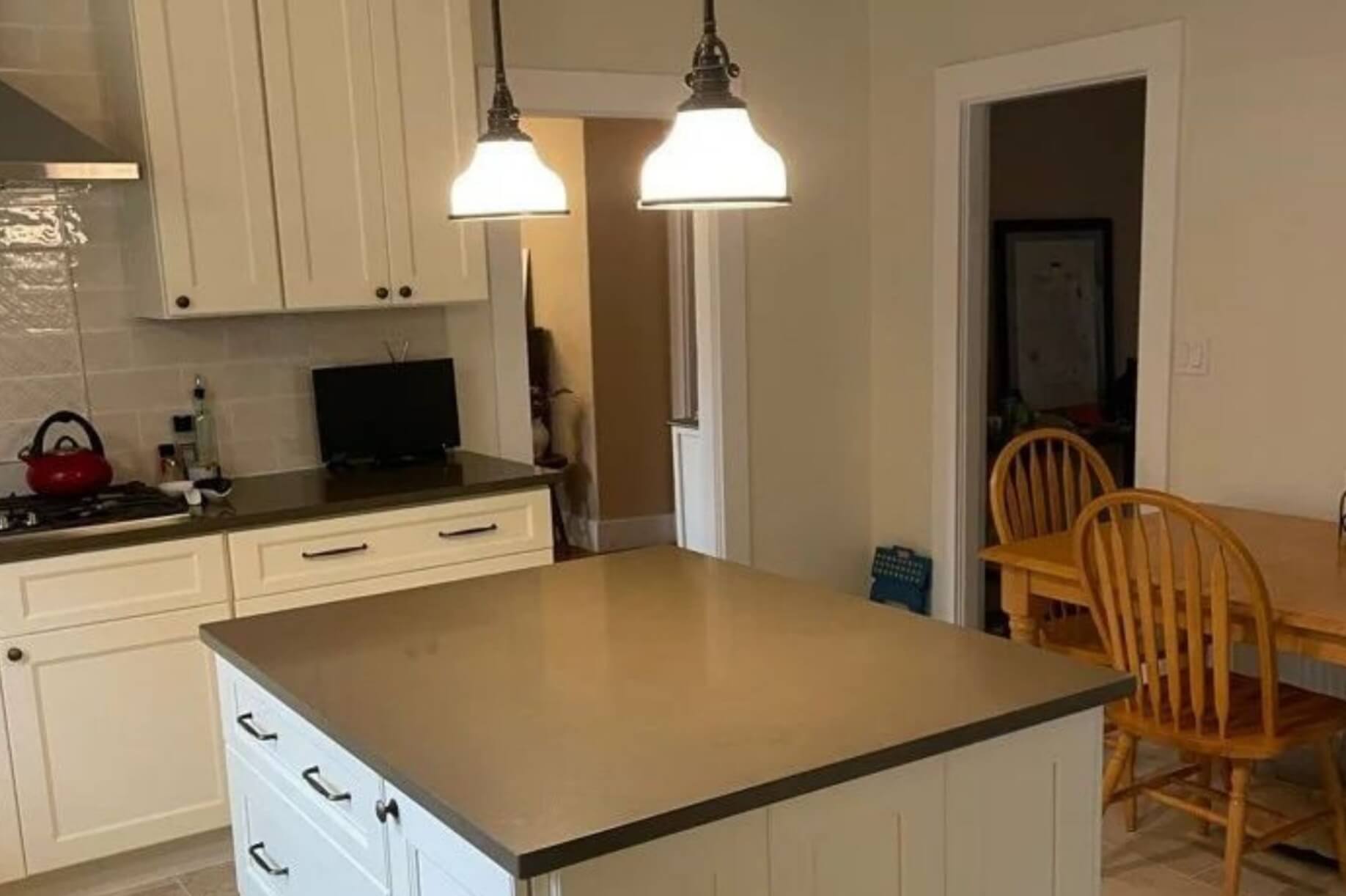 Expanded kitchen area through home addition – bathroom remodeling Sudbury MA