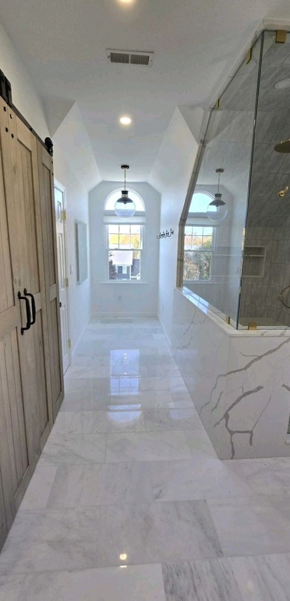 Team working on home remodeling marlborough ma project with tools and construction materials 2